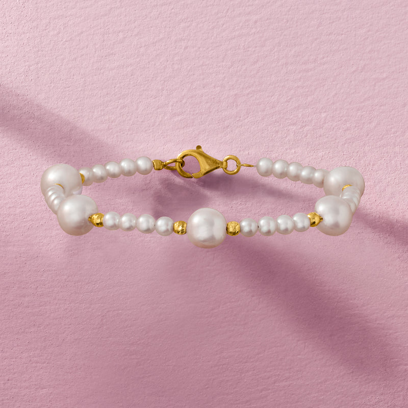 Cultured pearl station bracelet with gold clasp and pearl bead rows