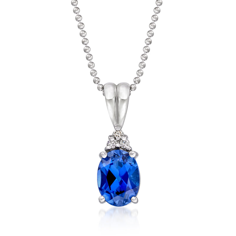 White gold pendant necklace with blue sapphire and diamond accents