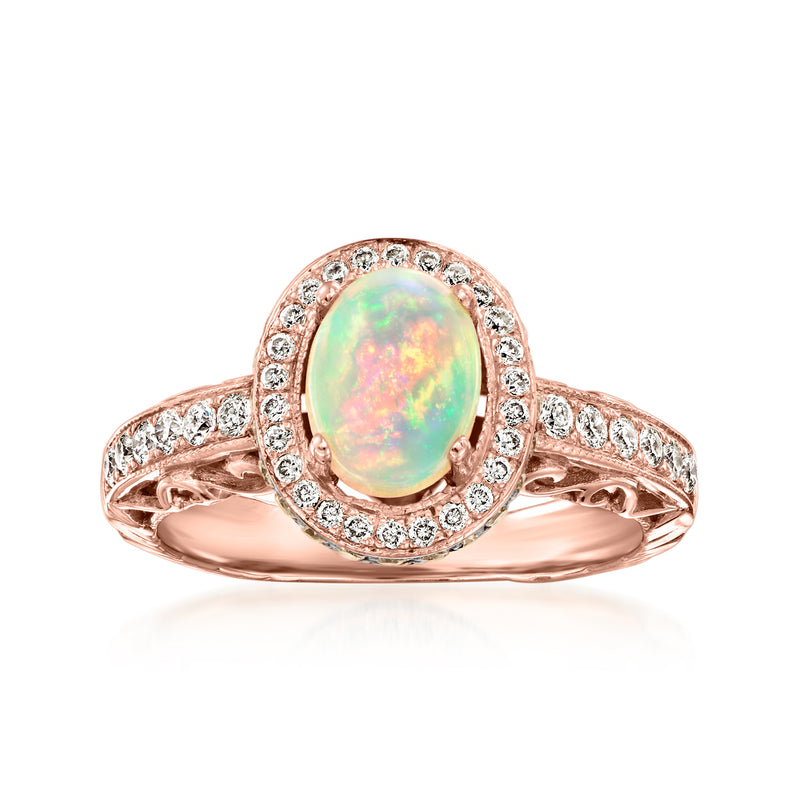 Opal and diamond halo ring in rose gold, oval opal center with round diamond accents