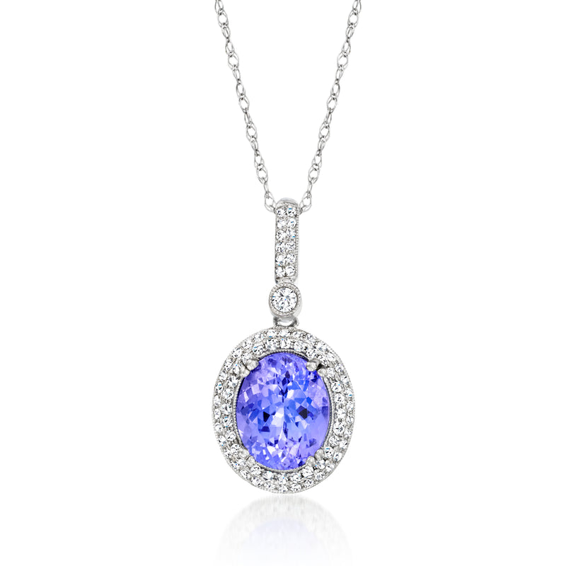 Vintage white gold pendant necklace with oval blue-violet tanzanite and diamond halo