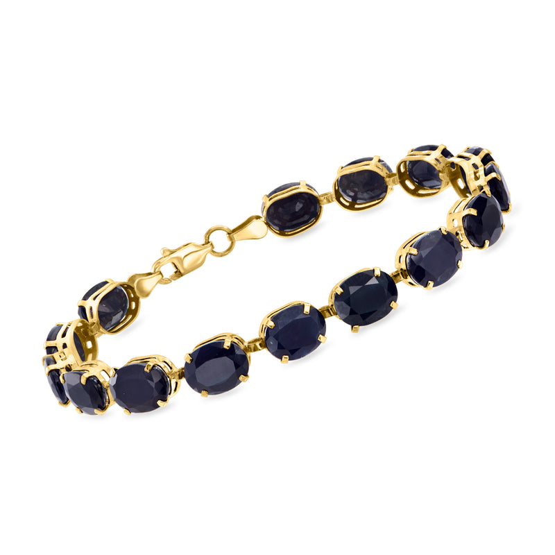 10kt yellow gold sapphire bracelet with round dark blue stones and toggle clasp