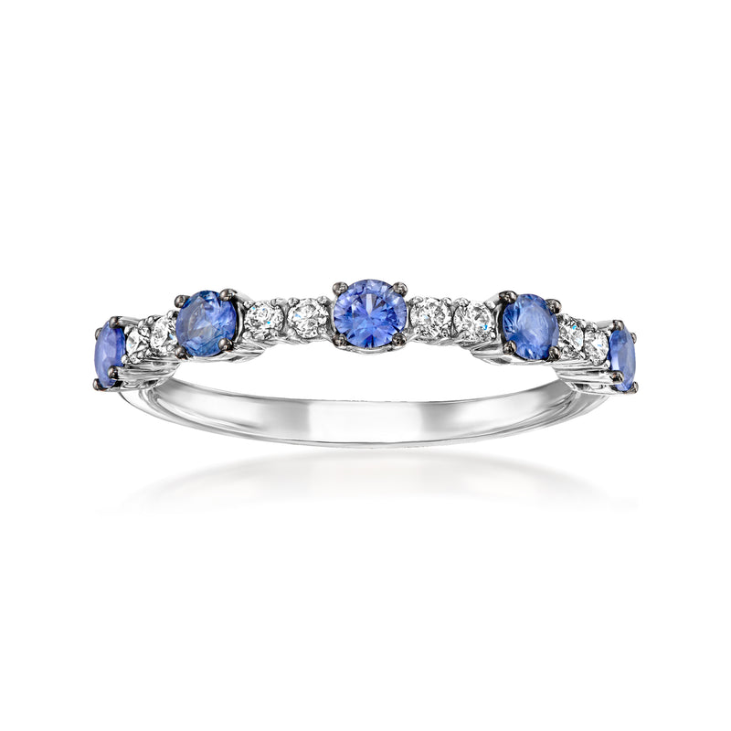 Platinum ring with blue oval sapphires and white diamond accents along the top