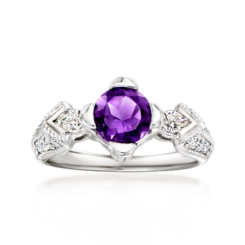 White gold amethyst ring with oval purple center and diamond side clusters