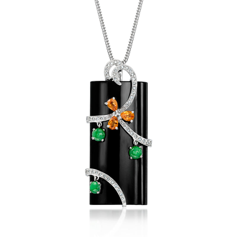 Black onyx pendant with orange sapphire, green emeralds, diamond accents, white gold chain