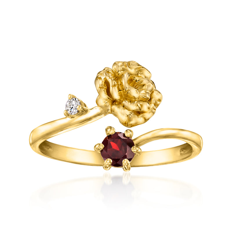 Gold floral birthstone ring with red garnet center and small diamond accents