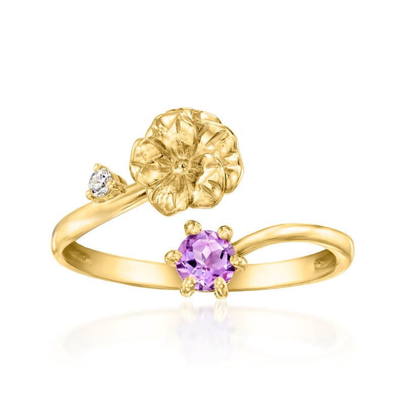 Gold tone flower ring with oval purple amethyst center and small clear diamond accents