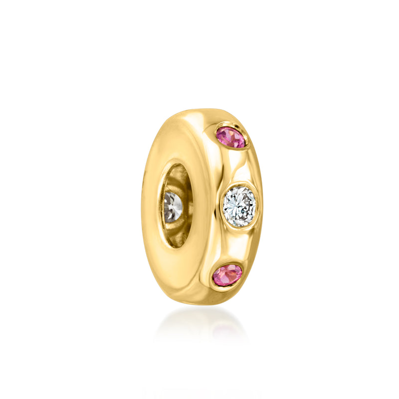 Gold oval bead charm with clear stone center and pink stones top and bottom