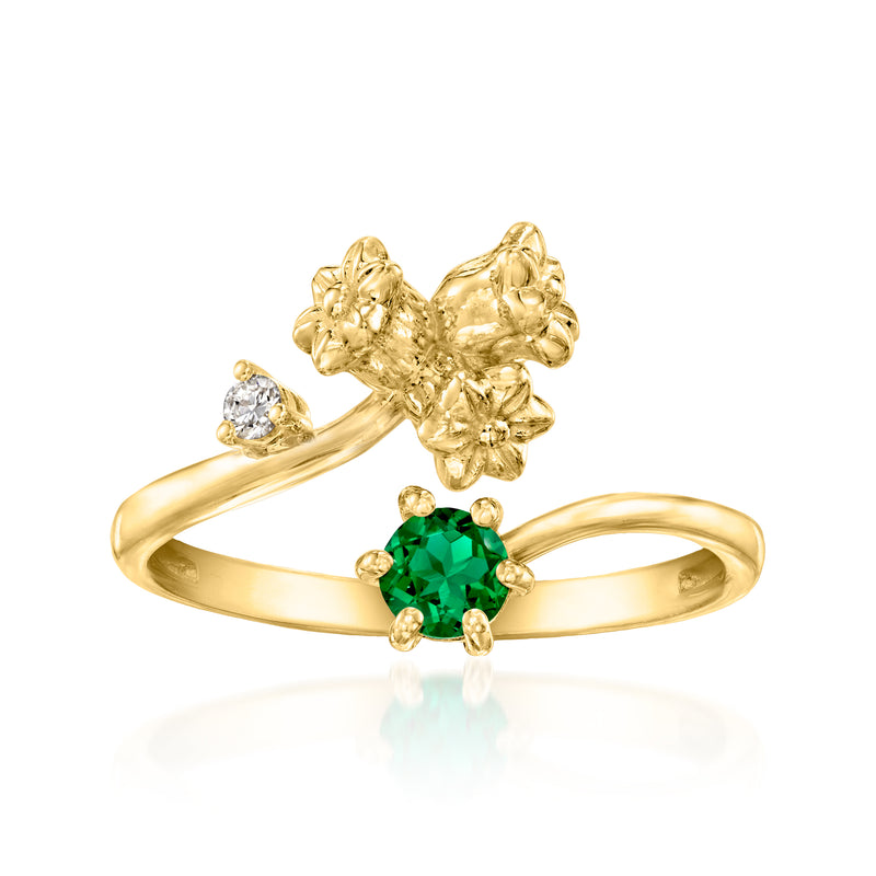 Gold lily of the valley ring with green oval emerald and small round diamond accents