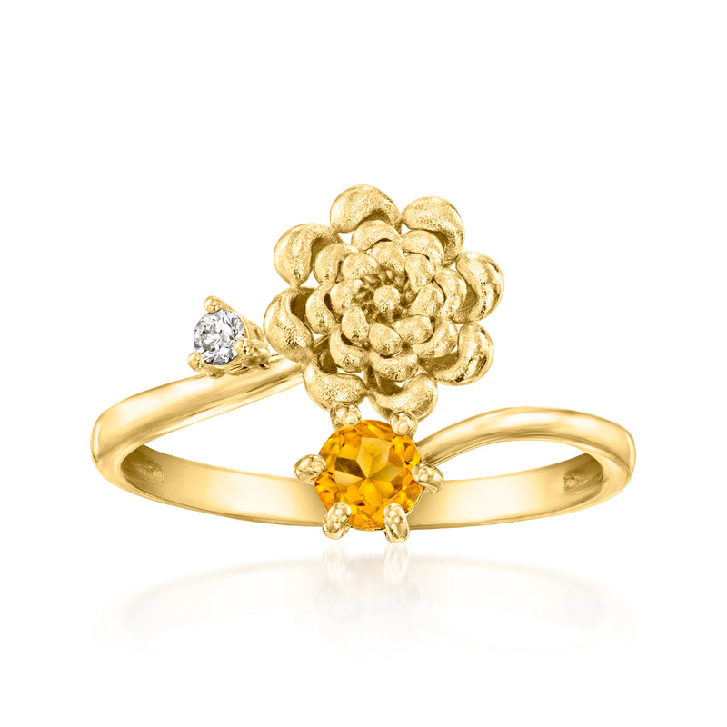 Gold-tone ring with chrysanthemum flower, citrine stone, and small diamond