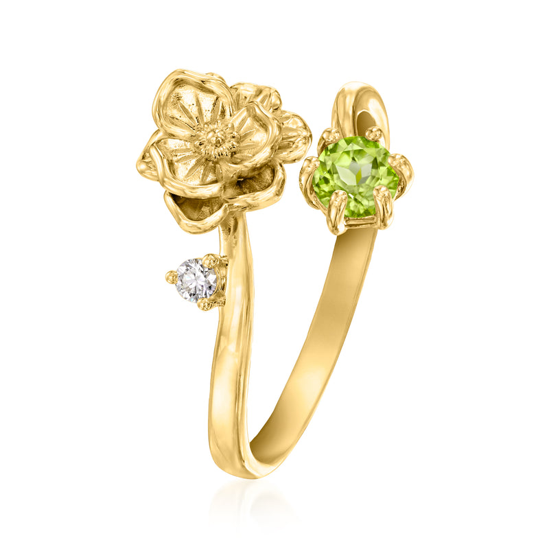 Gold over sterling open flower ring with green peridot center and small diamond accents