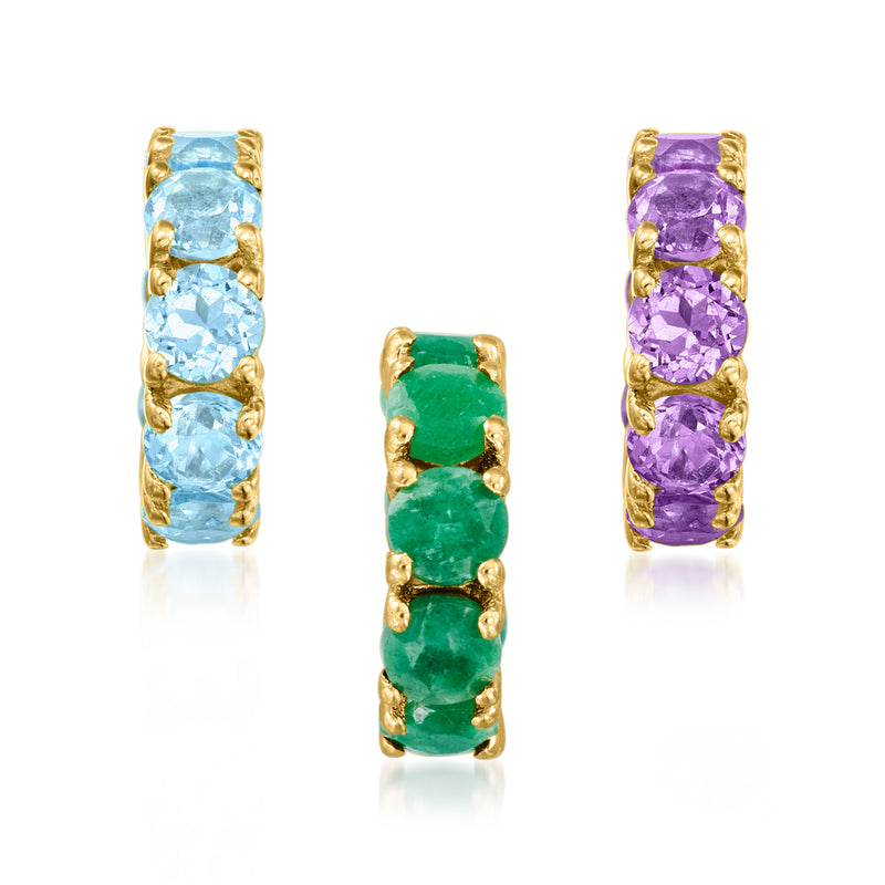 Gold birthstone bead charm with three light blue oval gems and lattice frame