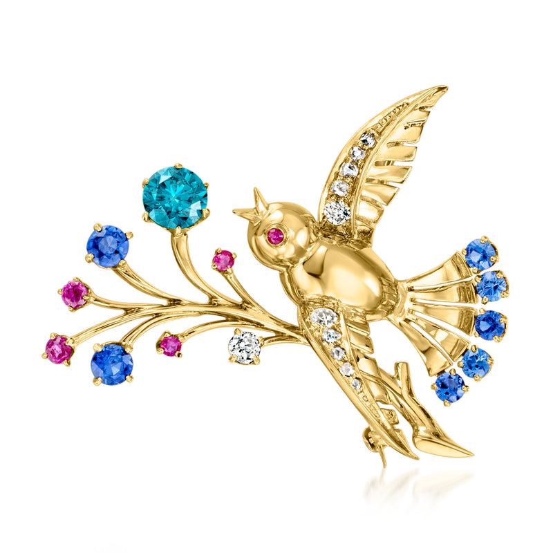 18kt yellow gold bird pin on branch with blue, pink, and clear gemstones, diamond accents