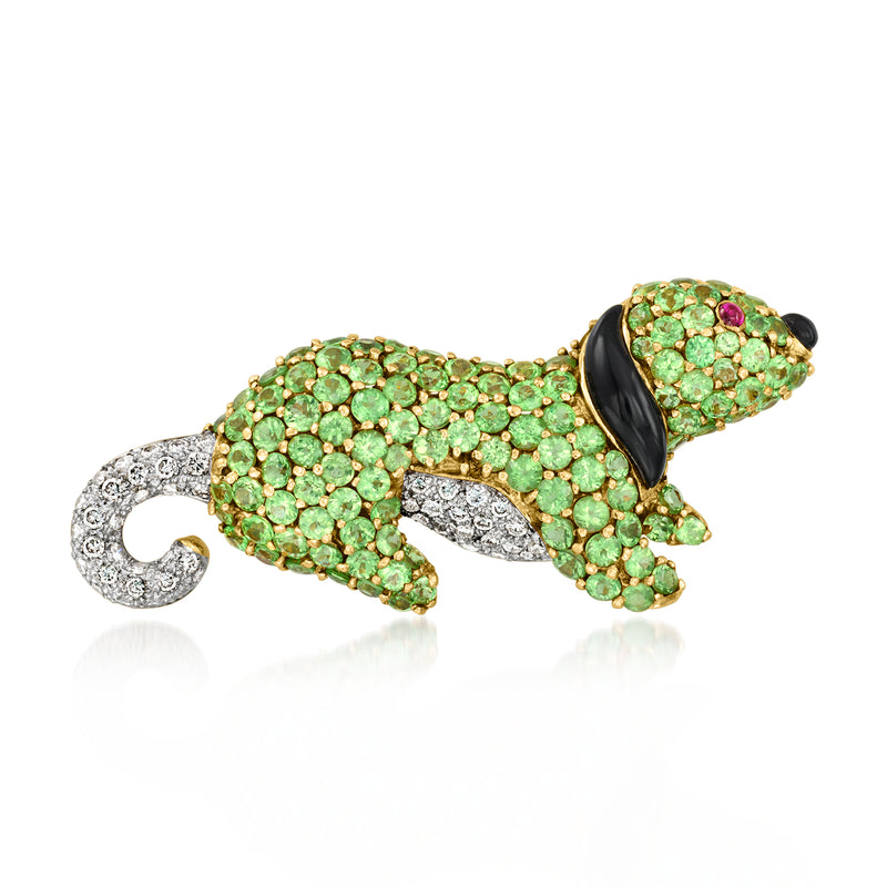 Jeweled dog lapel pin with green stones, black tail, and ruby accent on gold-tone setting
