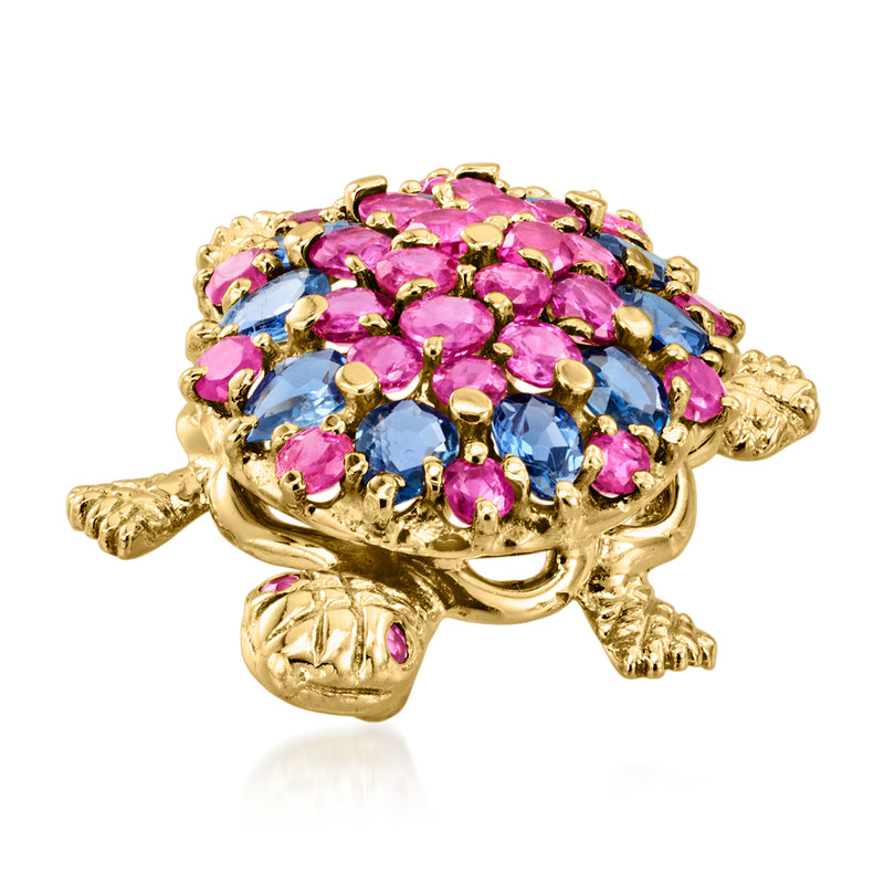 Gold turtle brooch with round pink and blue gemstone clusters, raised border