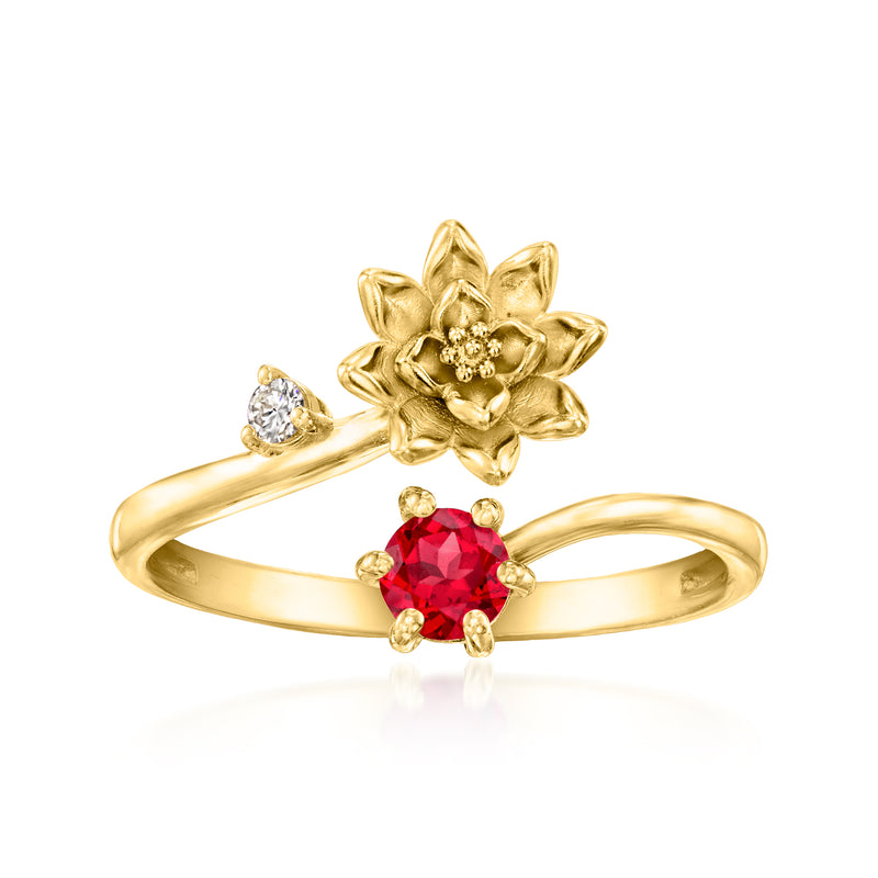 Gold flower ring with red lab-grown ruby center and small lab-grown diamond accents