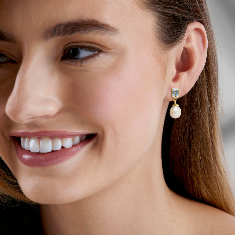 Cultured pearl drop earrings with sky-blue topaz square studs in gold setting