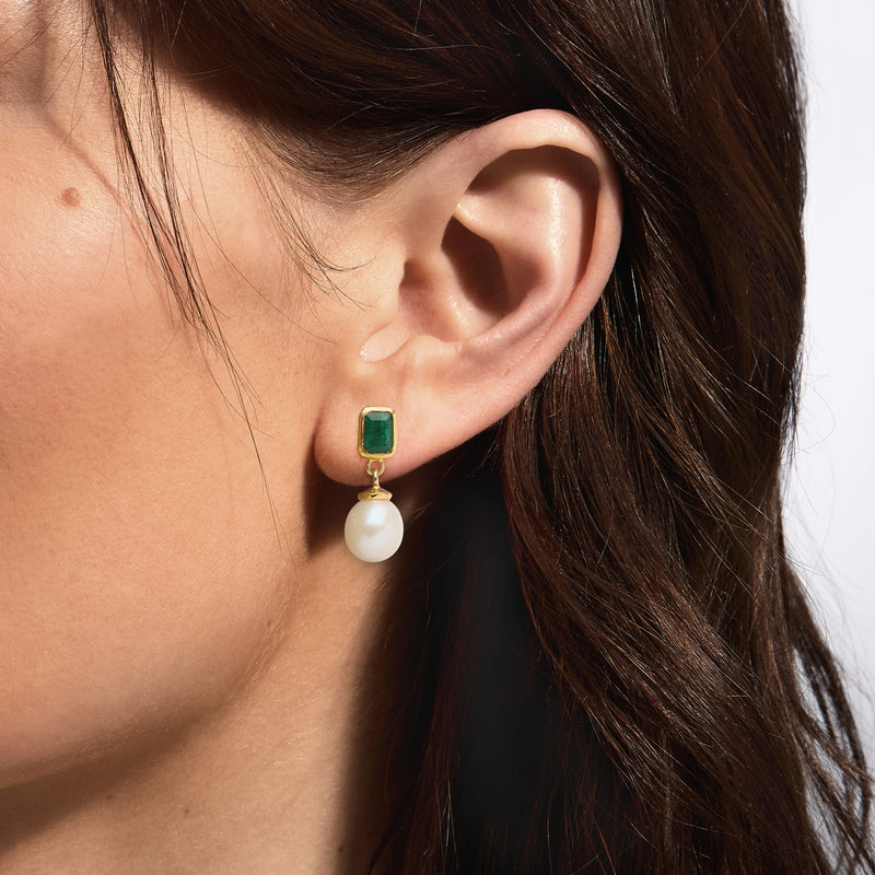Cultured pearl drop earrings with small square green gemstone on gold earwire