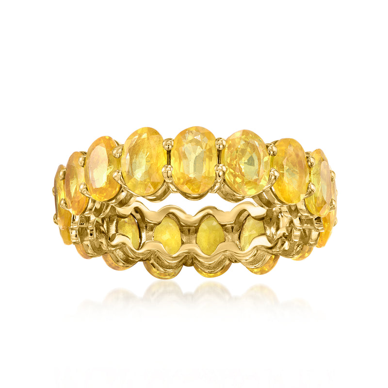 Yellow gold eternity band with oval yellow sapphire gemstones, scalloped setting
