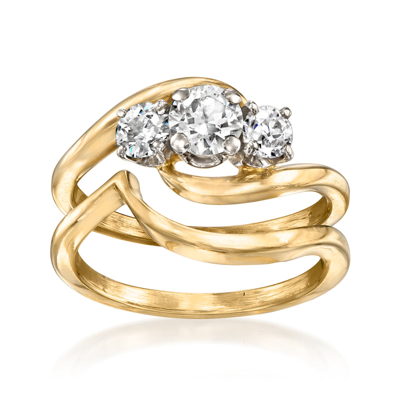 Vintage 14kt yellow gold diamond bridal set with three-stone center and curved band