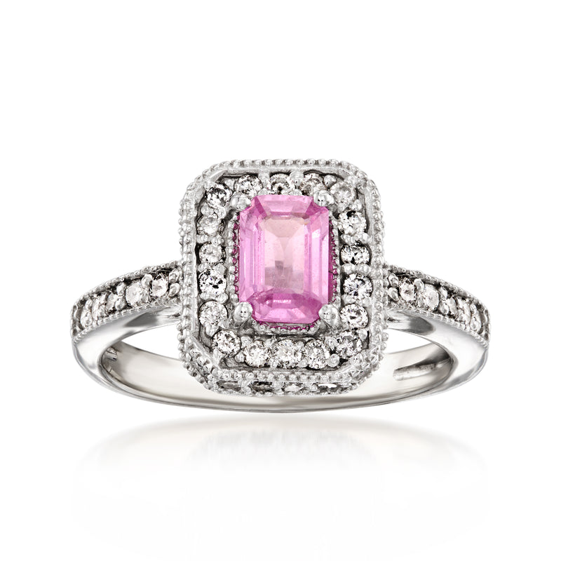 Vintage pink sapphire ring with emerald-cut center, diamond halo, 14kt white gold band