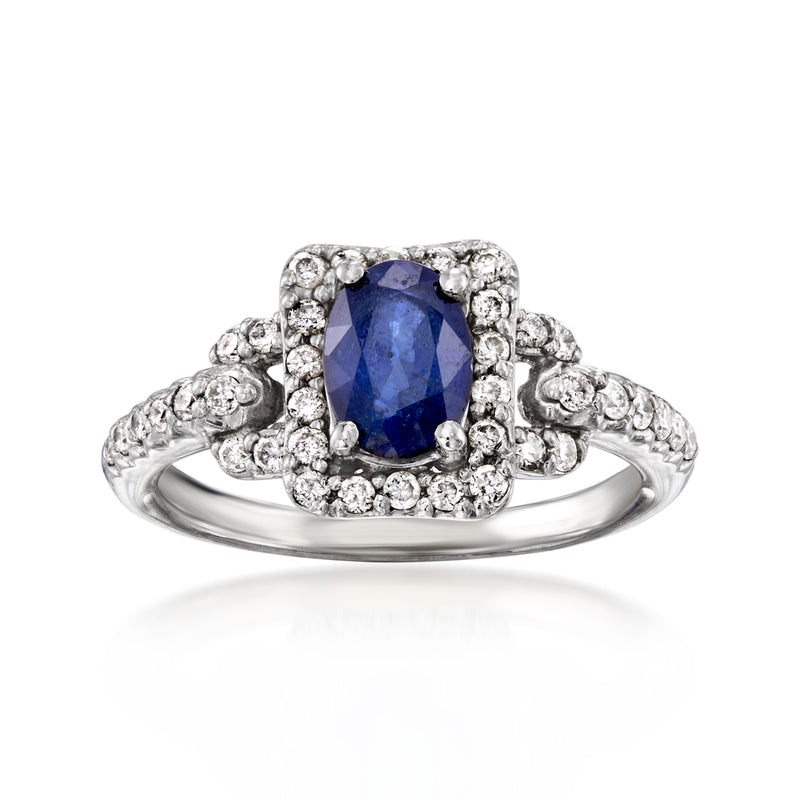 Vintage sapphire and diamond cluster ring in 14kt white gold, blue oval center
