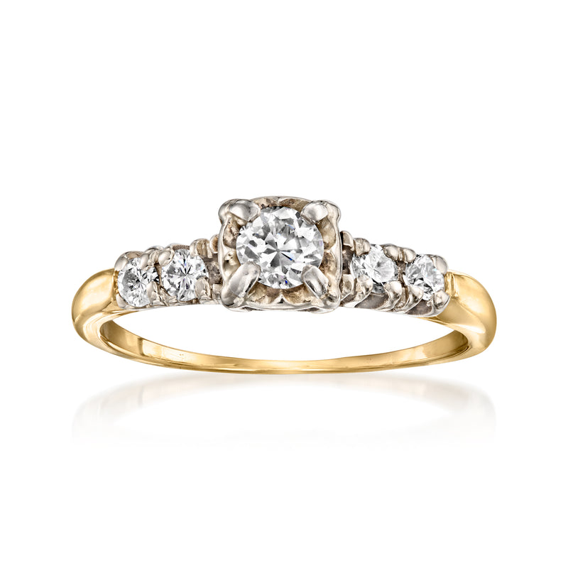 Vintage 14k yellow gold diamond ring with oval center and three side stones