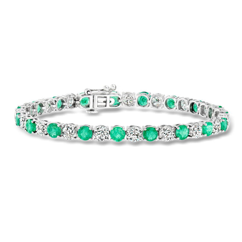 14kt white gold tennis bracelet with emerald green stones and lab-grown diamond accents