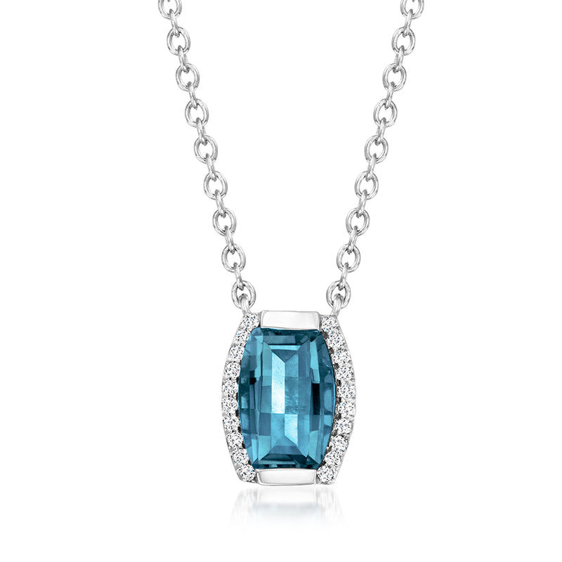 Sterling silver necklace with blue topaz cushion pendant and sparkling side stones