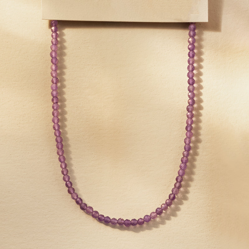 Amethyst bead necklace with round purple beads, straight layered look
