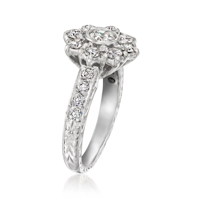 Platinum diamond flower ring side view with prong-set stones on tapered band