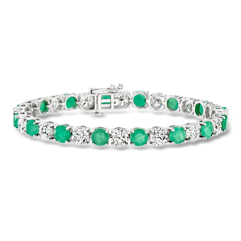 14kt white gold tennis bracelet with green emerald stones and diamond accents, clasp