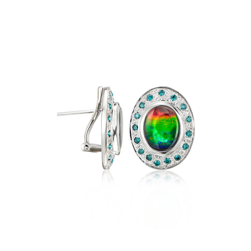 White gold clip/post earrings with oval opal center and blue stone halo, side view
