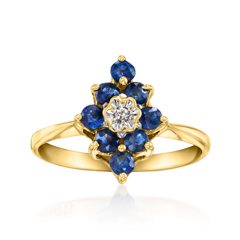 10kt yellow gold vintage ring with round blue sapphire cluster and single diamond center