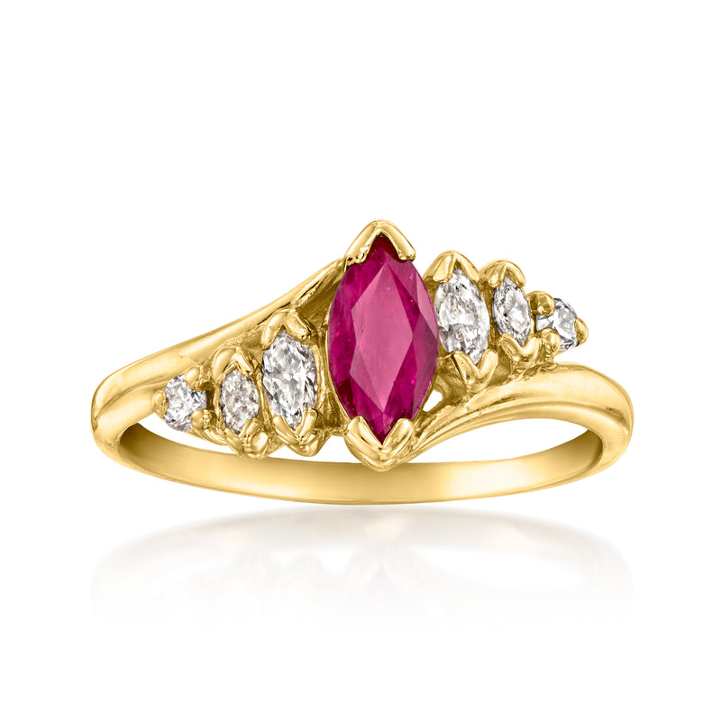 14kt yellow gold vintage ruby and diamond marquise ring with raised prongs
