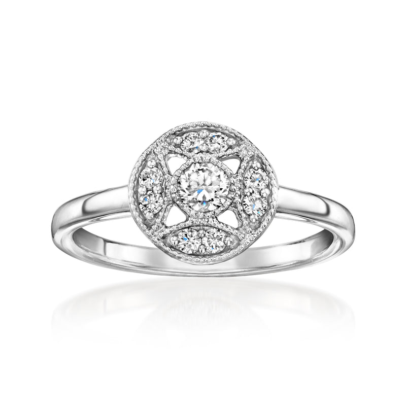 Sterling silver vintage halo diamond ring with round center stone and pave details