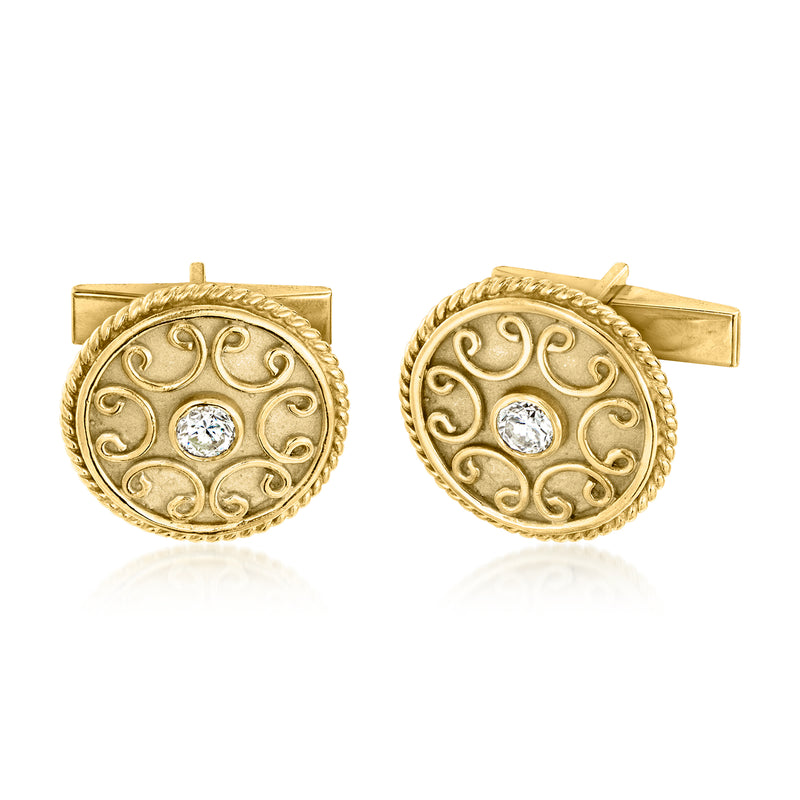 Pair of round yellow gold cuff links with filigree and central diamond, square backs