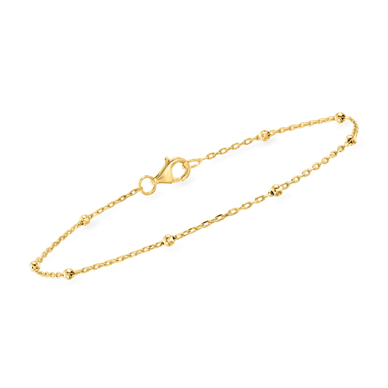 Gold-tone bead-station chain bracelet with oval link clasp