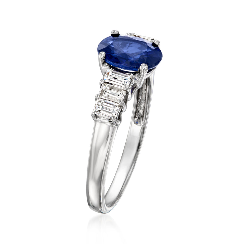 White gold sapphire ring with baguette diamond shoulders, oval blue center