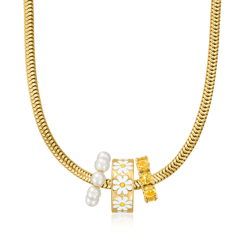 Gold chain necklace with floral pearl charm and small yellow gemstone