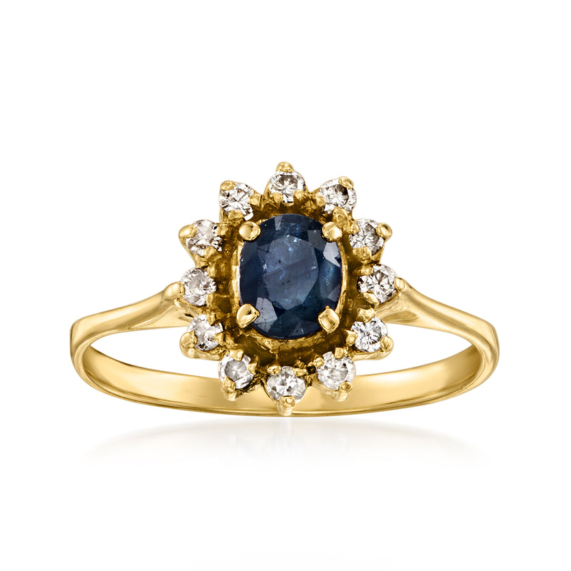 Vintage 14kt yellow gold ring with oval blue sapphire, diamond halo and round accents
