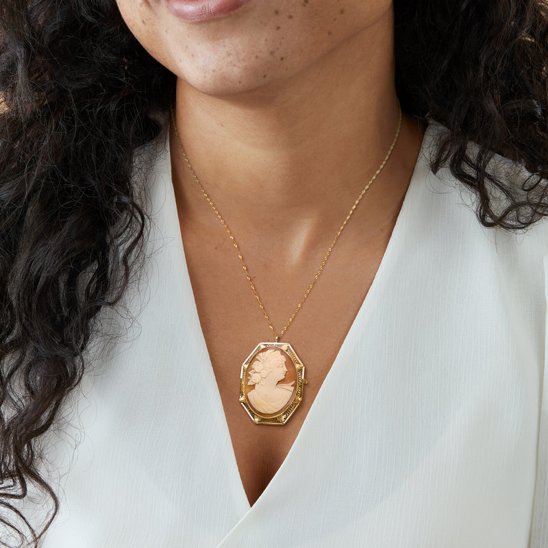 14kt yellow gold cameo pendant with oval brown shell portrait, set on thin chain