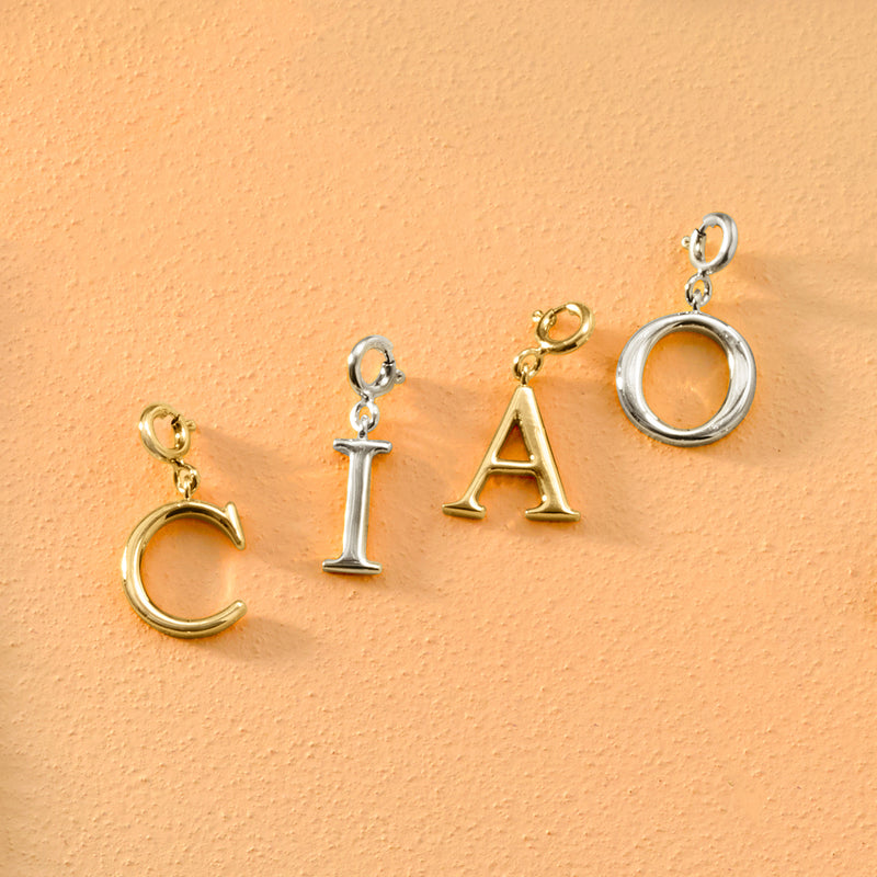 Initial charm set letters C, I, A, O in mixed silver and gold tones