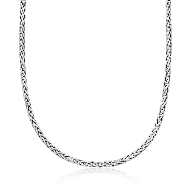 Sterling silver braided wheat-chain necklace, close-up of chain links