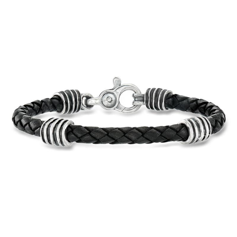 Sterling silver braided leather bracelet with black woven cord and secure clasp