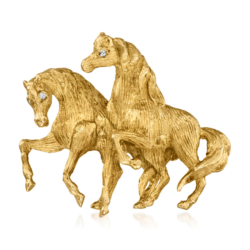 Yellow gold horse-shaped tie pin with diamond eyes, three horses design