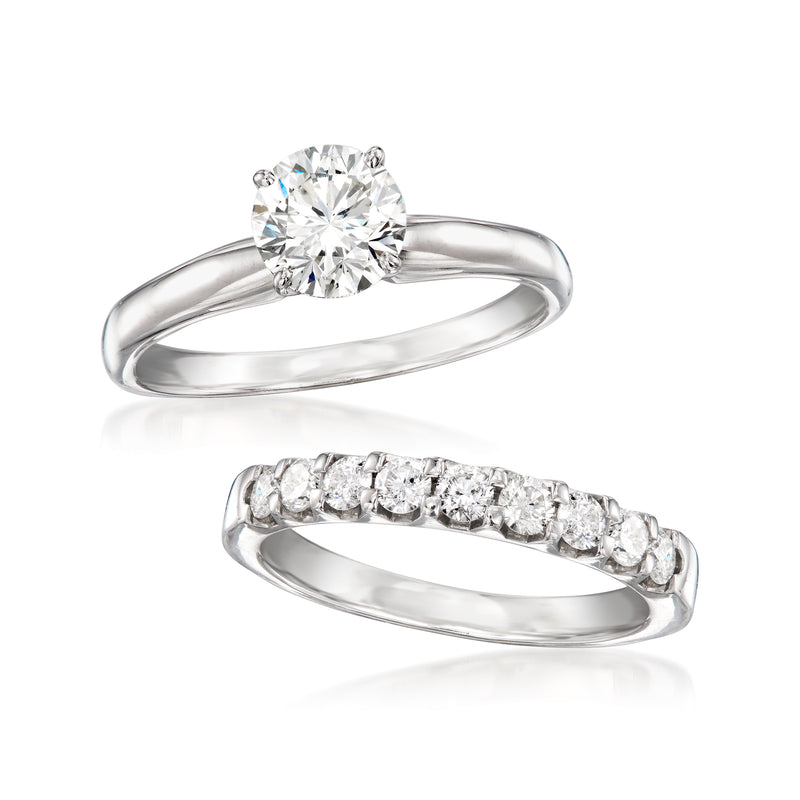 Round diamond solitaire ring with stacked pave diamond band in white gold
