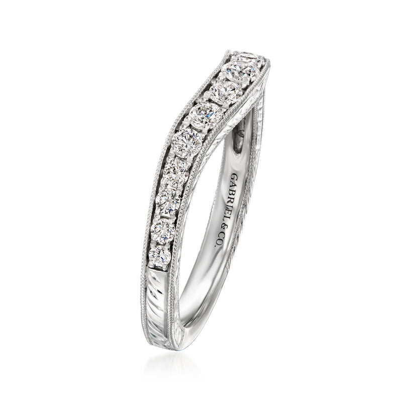 White gold diamond chevron ring with raised row of stones, side view