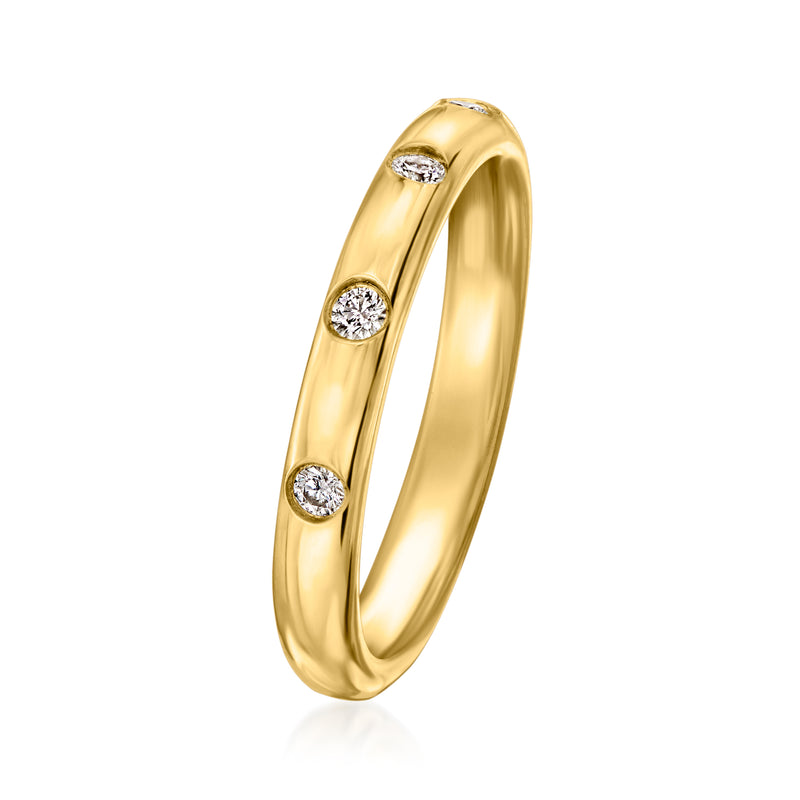 14kt yellow gold diamond station ring, angled view with three round stones