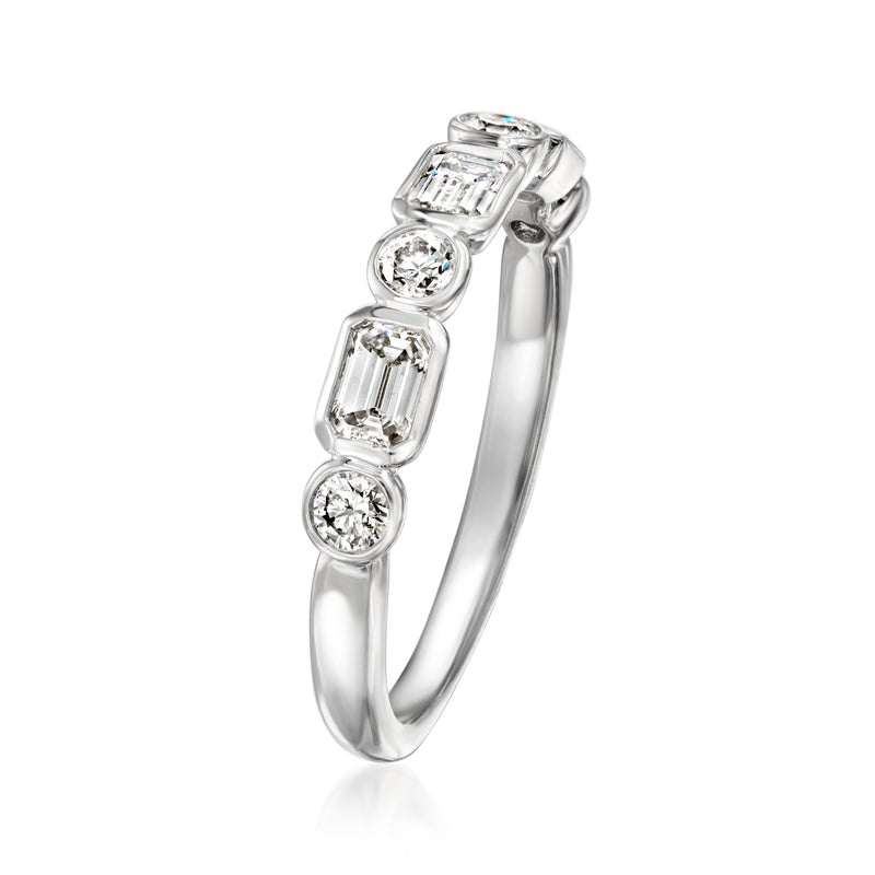 14kt white gold diamond ring with emerald-cut center and round side stones