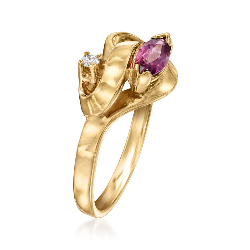 Yellow gold knot-style ring with oval purple gemstone and tiny diamond on side